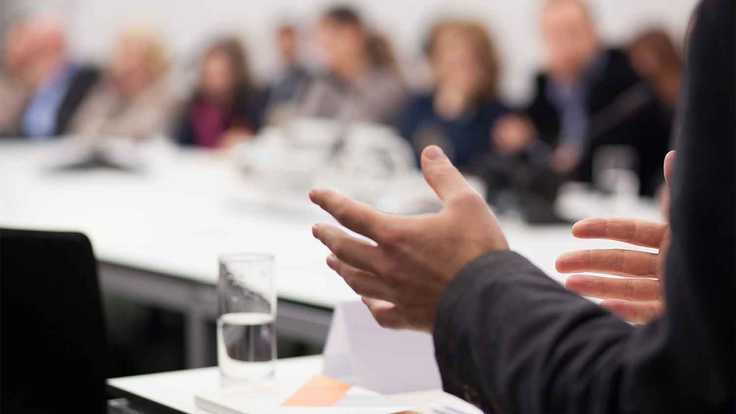 Person chairing a meeting