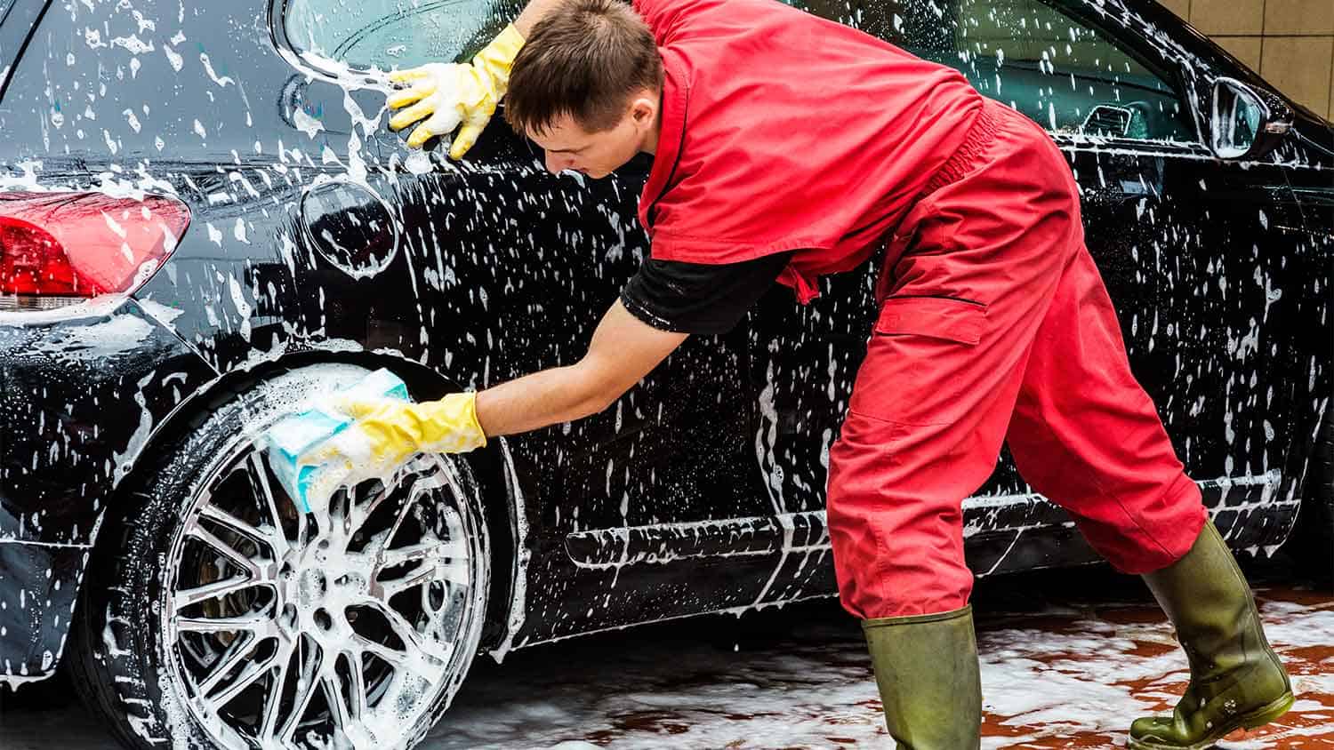 Man washing a car