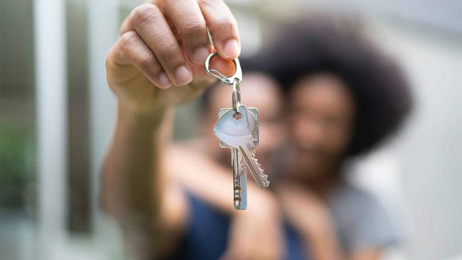 Woman dangling a set of keys