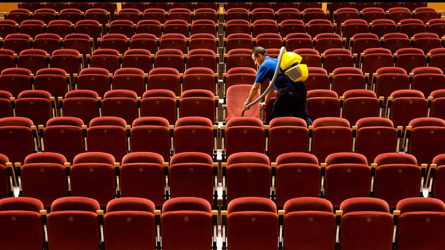 Empty theatre being cleaned