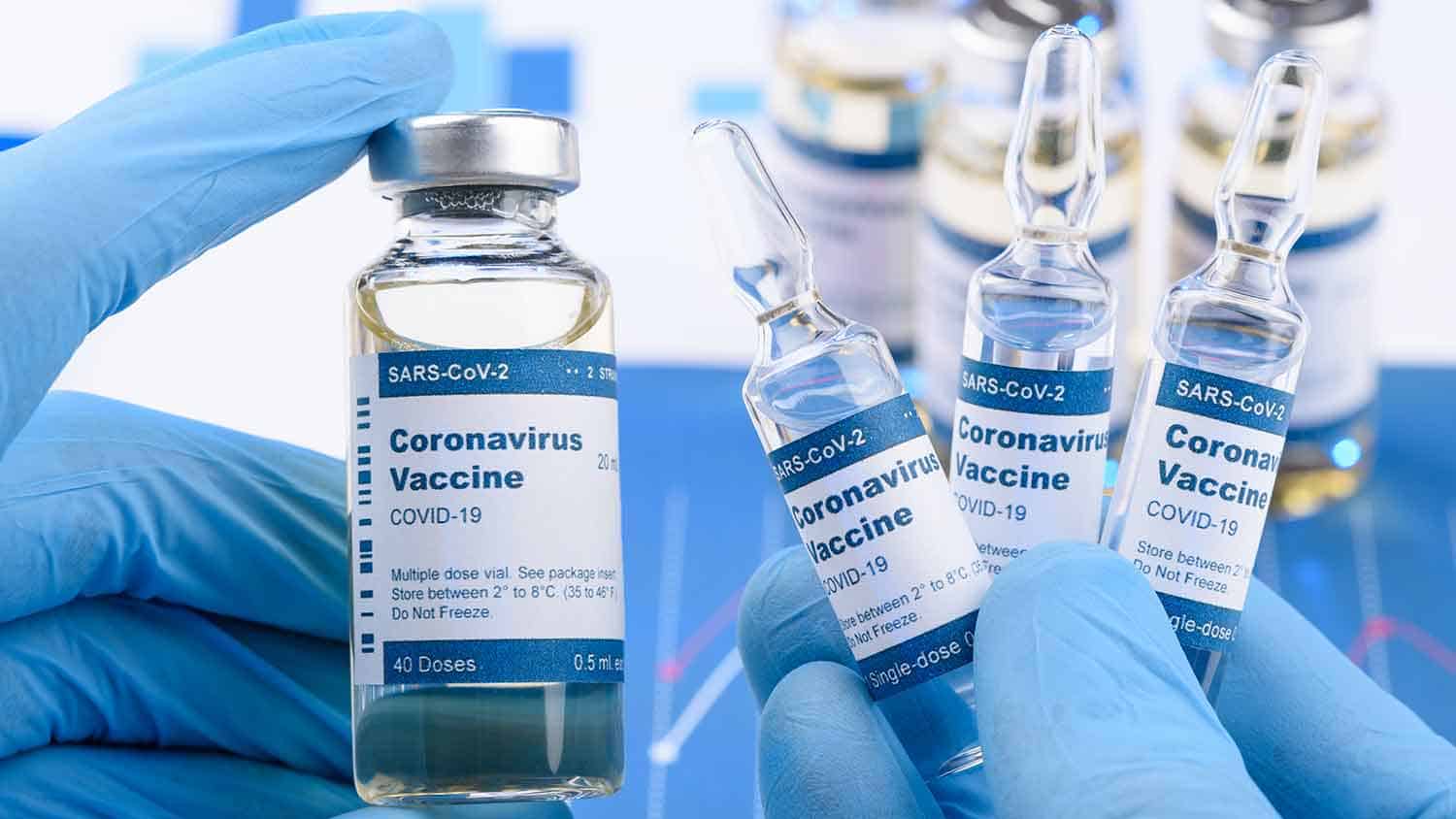 Close up images of small bottles labelled 'Coronavirus vaccine'
