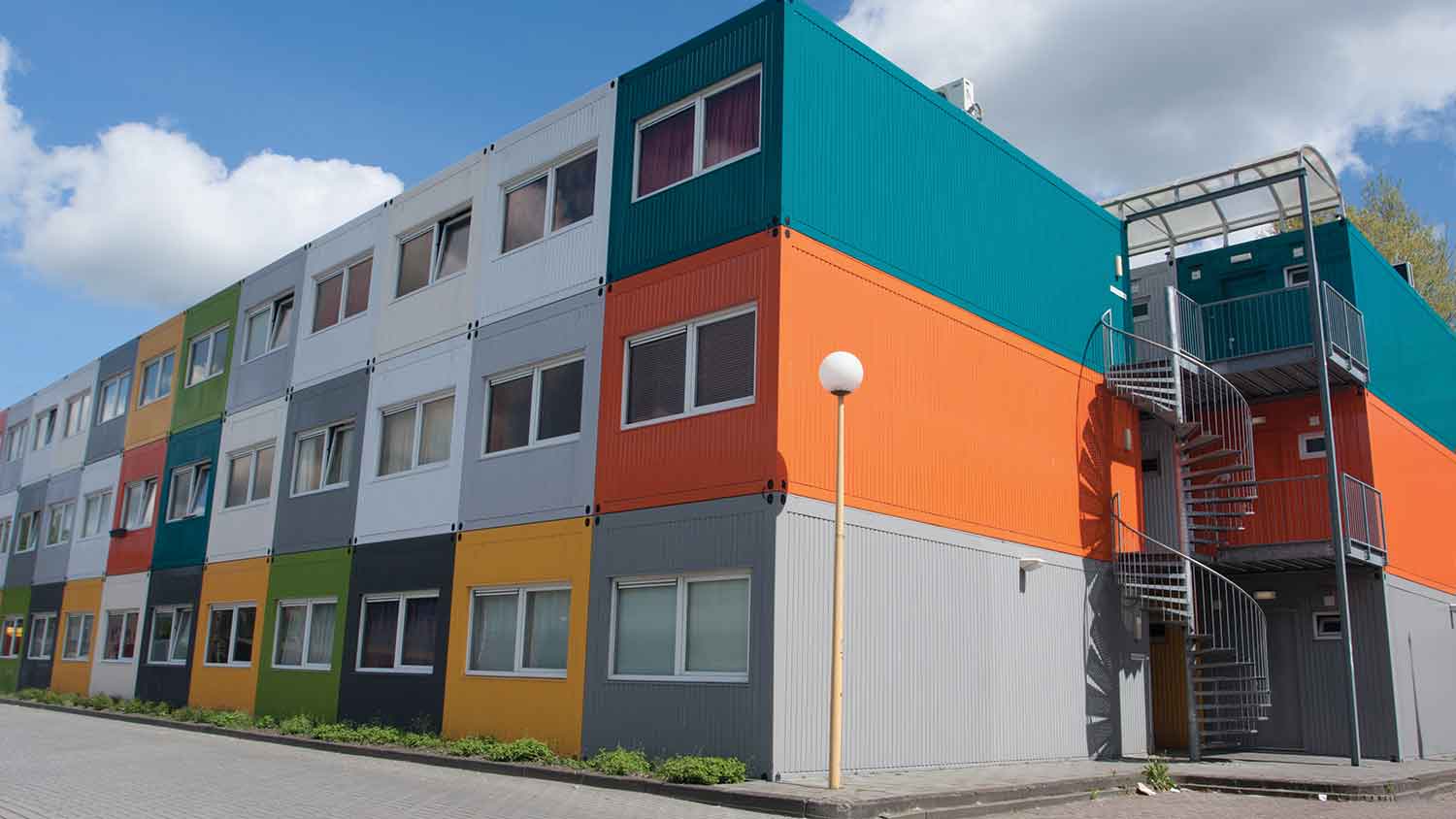 Temporary box houses stacked on top of each other