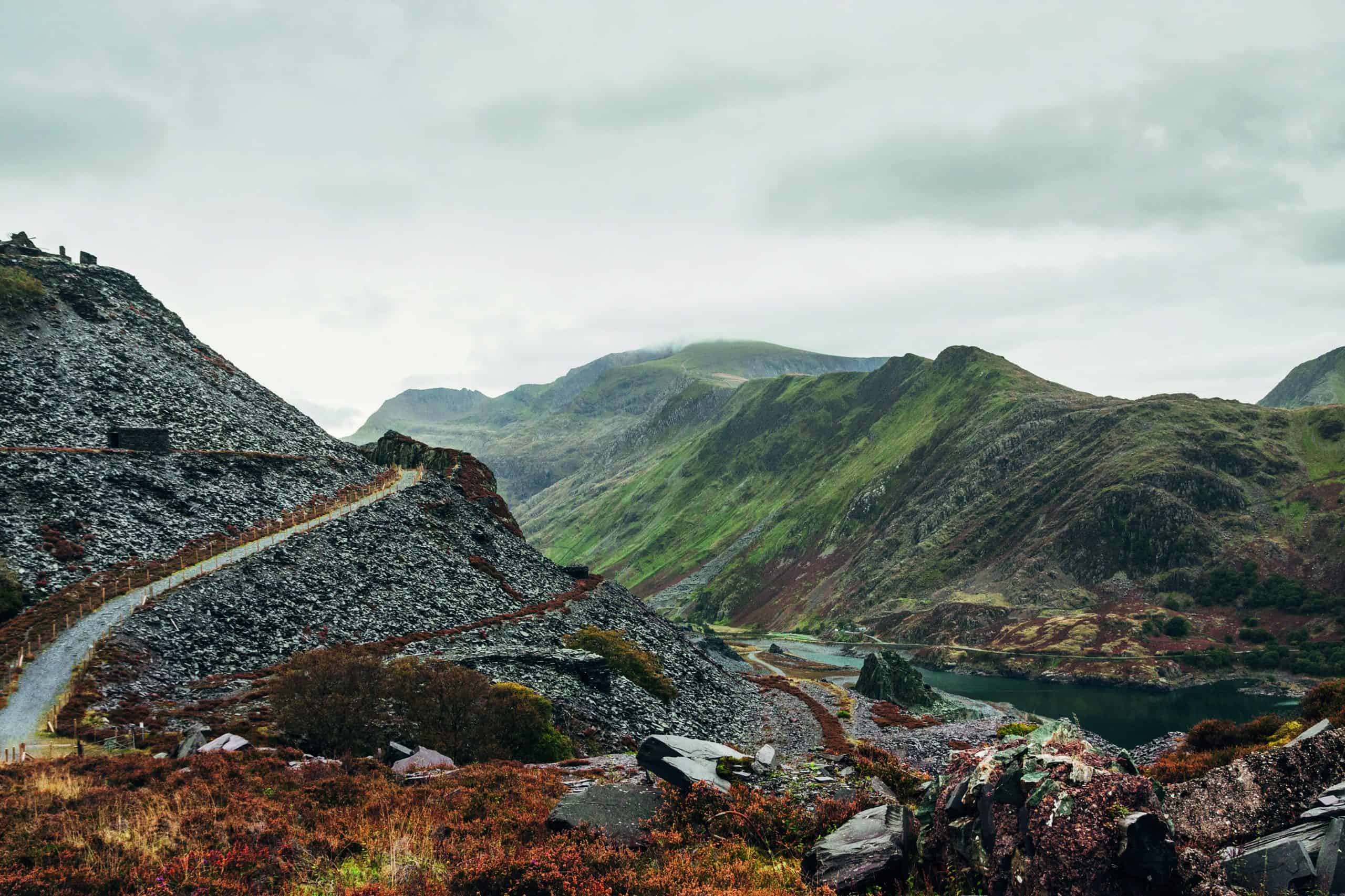 A slate quarry with Mount Snowdon in the background