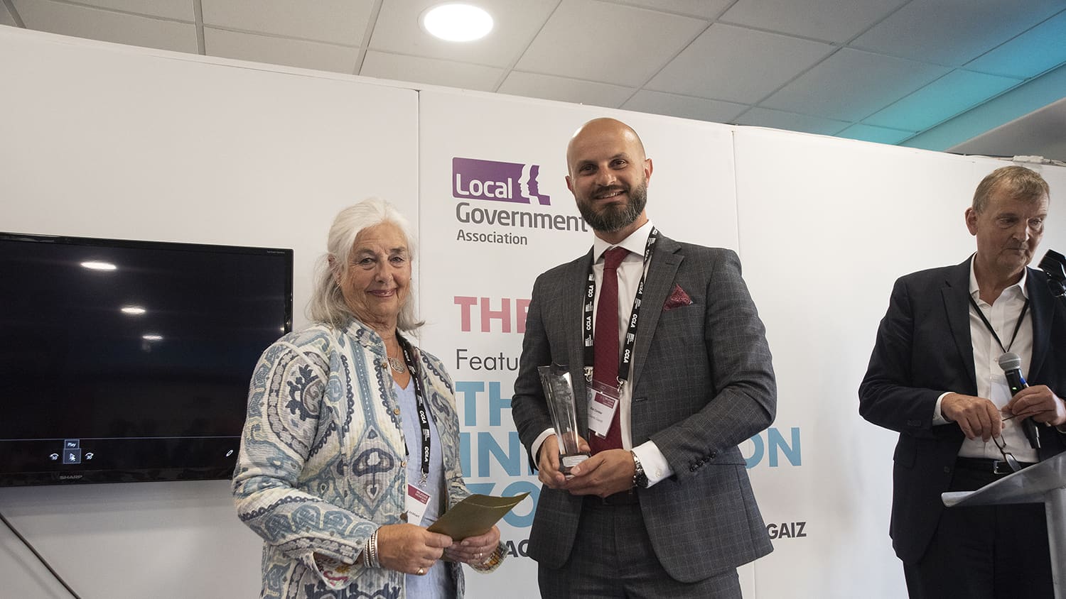 Rob Comber collecting winner's award for 2019 Local Government Challenge