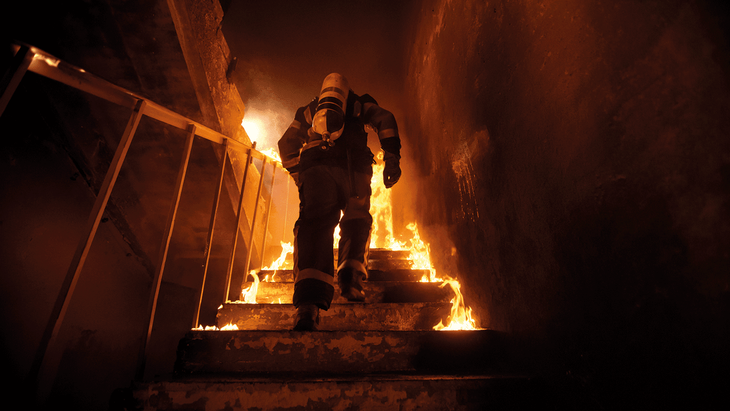 fireman running up the stairs