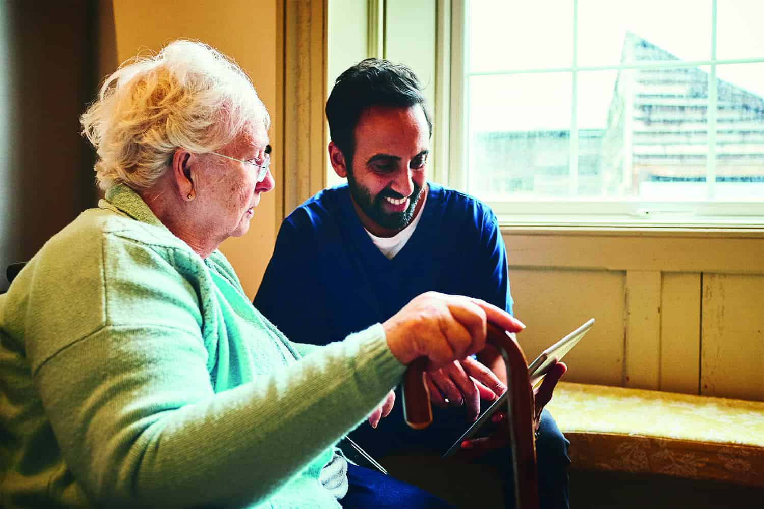 Older woman with male carer
