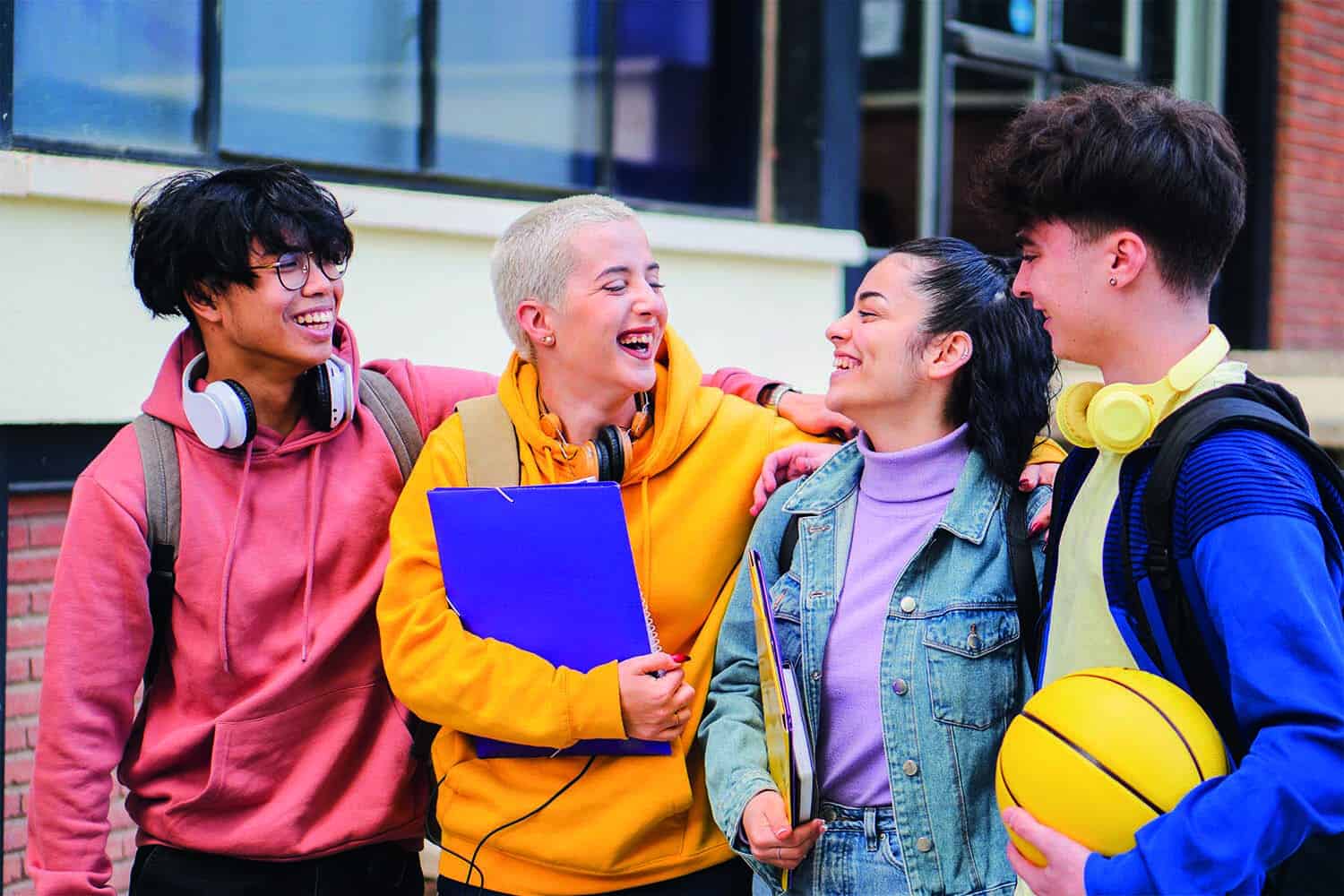 Group of smiling adolescents