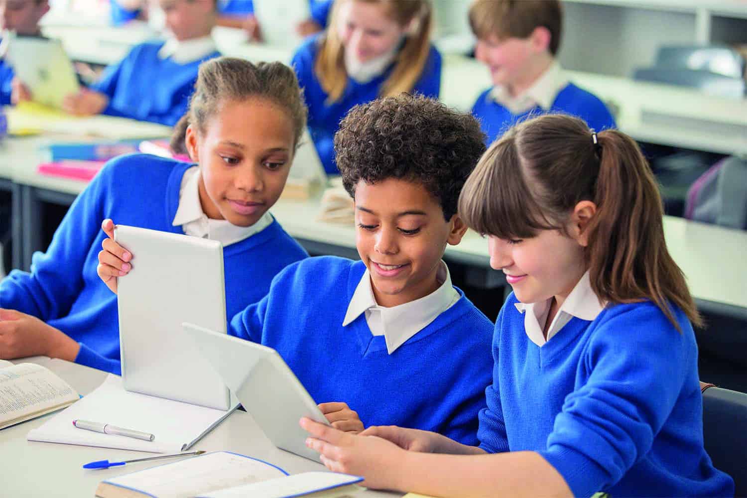 Primary school children using tablets