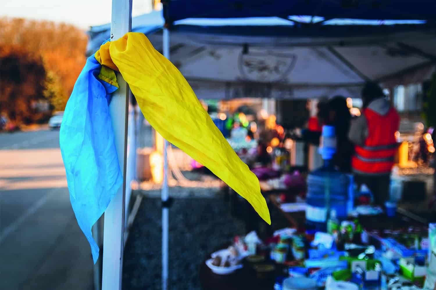 Ukrainian blue and yellow scarf tied to pole