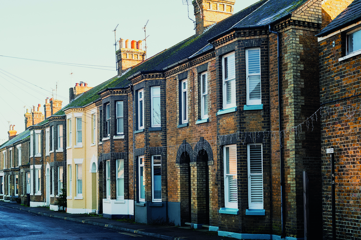 A street of semi-detached brick houses