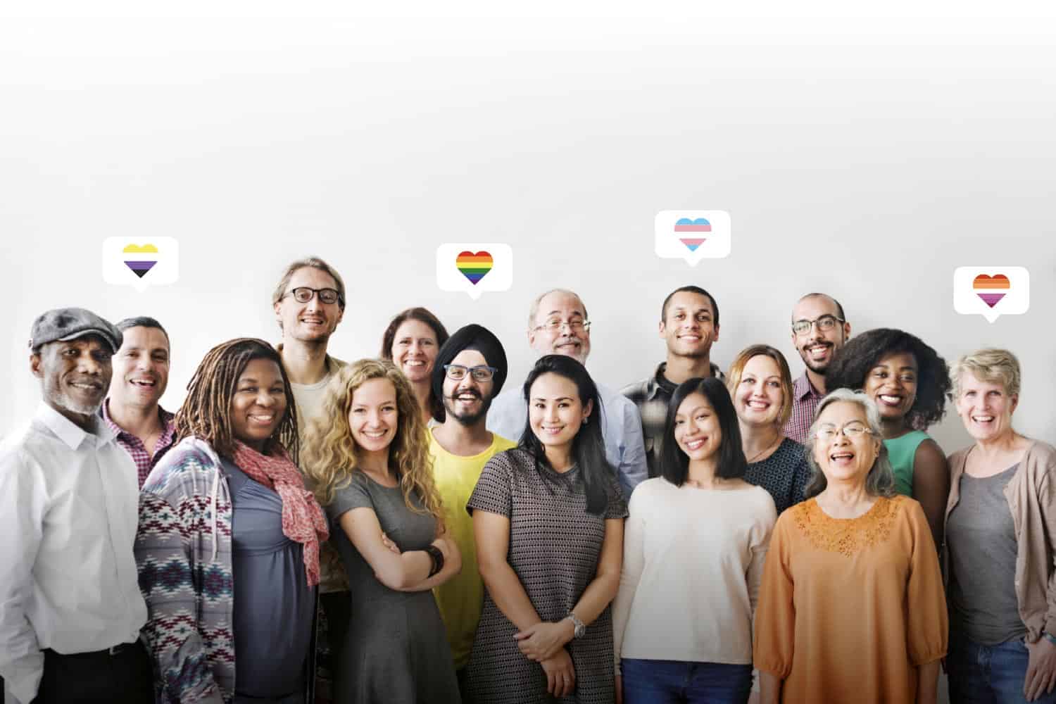 A diverse group of people smiling and posing for the camera