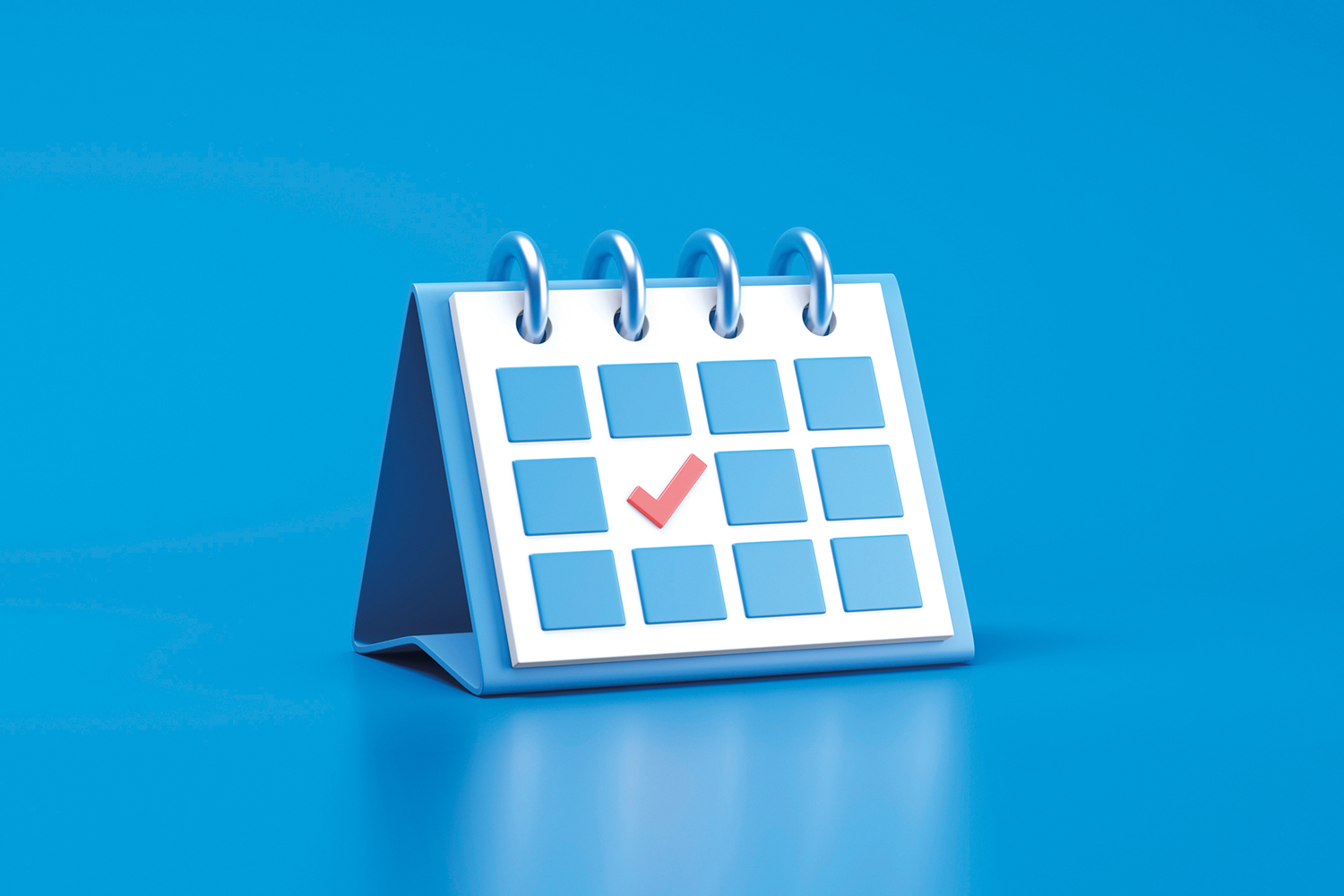 A blue and white desktop calendar