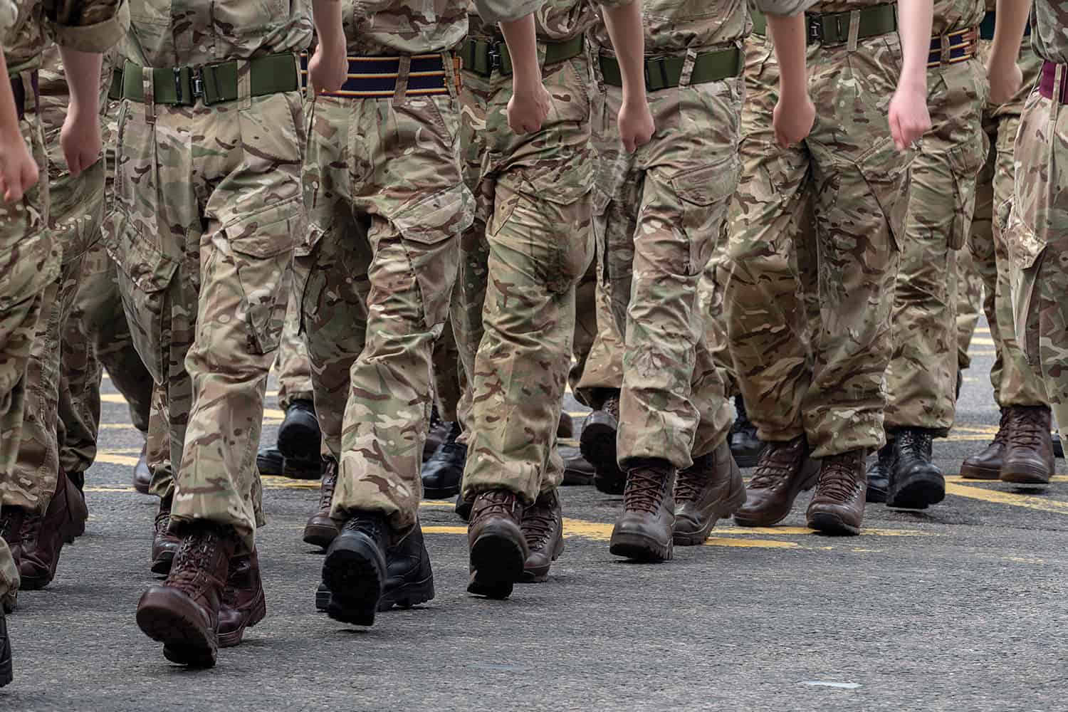 A number of soldiers marching in uniform order