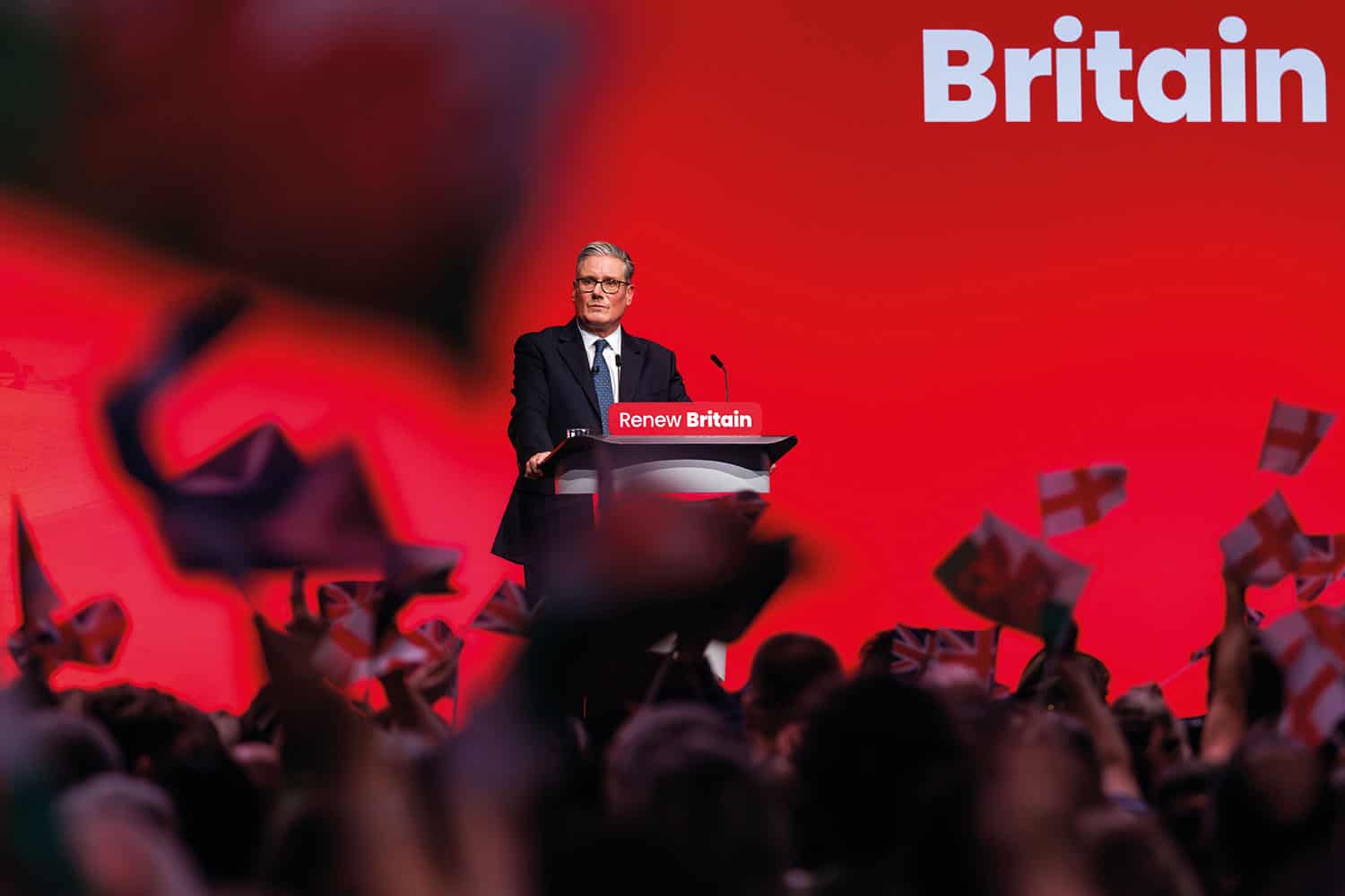 : photo of Prime Minister Sir Keir Starmer addressing the Labour Party Conference in Liverpool against a red backdrop