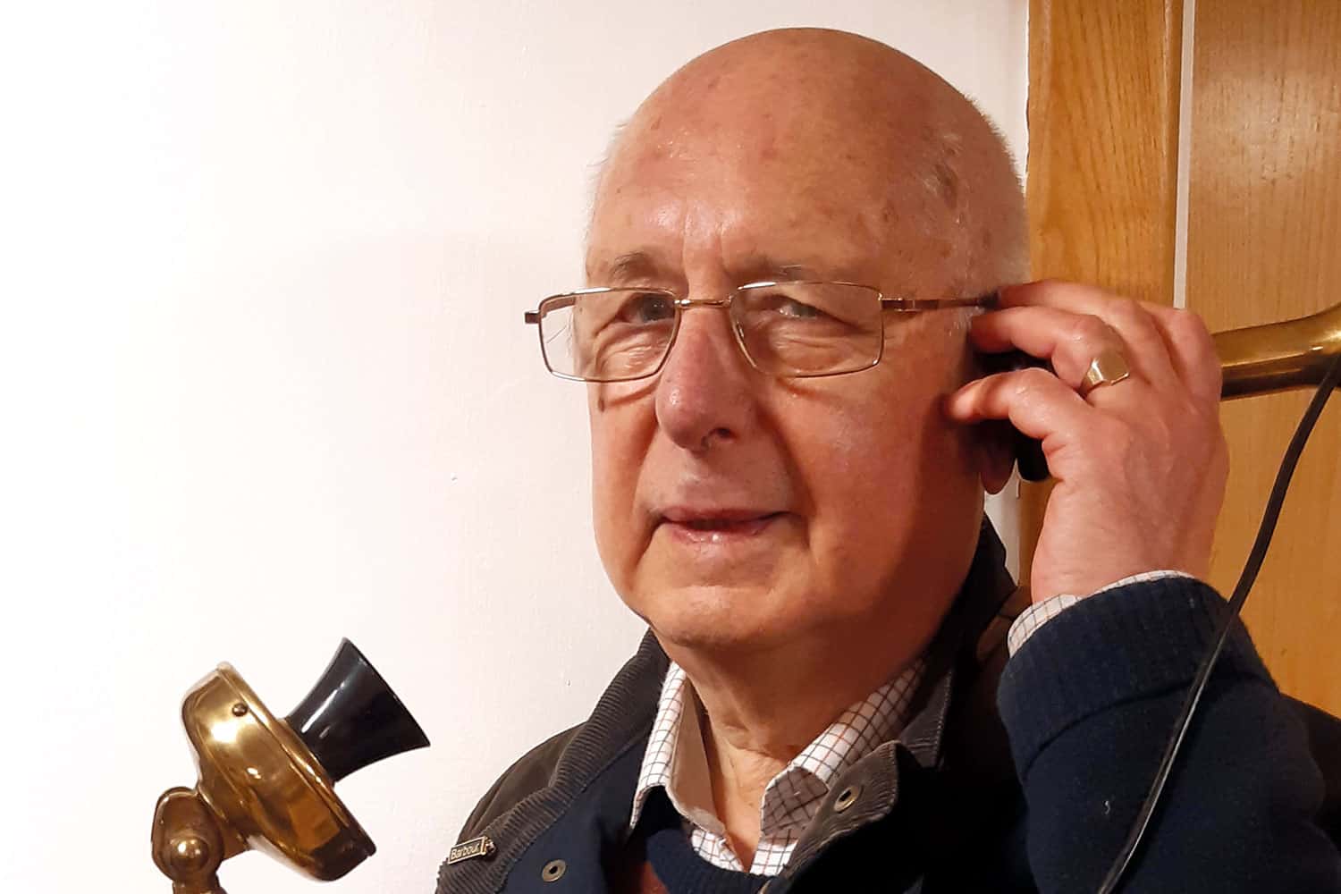 photo of Sir Ron on a very old fashioned telephone