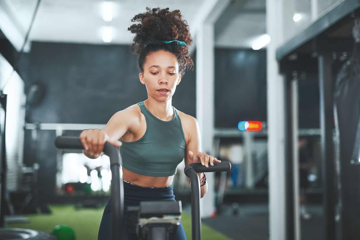 young woman working out in a gym