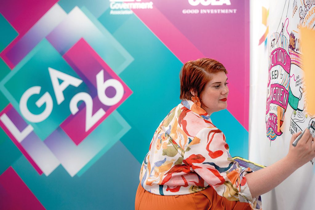 Live illustrator Becky James in the LGA Lounge