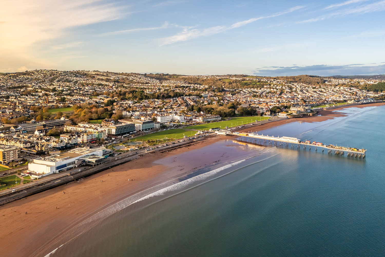 aerial photo from sea of Paignton Pier, Torbay, with views into Devon beyond